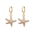 Boucles d'oreilles étoile de mer en émail blanc et plaqué or style marin - Étoile De Mer Nacrée (JE1541S)