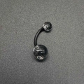 Curved UV belly button ring with black speckled clear acrylic balls and dark bar - Black Curved Bar Marble Pattern Belly Ring (JE1597B)