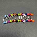Close-up of colorful acrylic curved barbells for eyebrow, navel, or lip piercings - A# Solid Color Round Head Eyebrow Stud