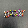 Macro detail of assorted colorful cone curved barbells for eyebrow and ear piercings - B# Solid Color Spike Head Eyebrow Stud