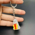 Glow-in-the-dark ghost keychain with yellow gift box made of translucent resin material - Ghost With Gift Box Style (JE1521G)