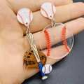 Boucles d'oreilles en acrylique pailleté avec batte et gant de baseball - Style Asymétrique Batte et Gant de Baseball (JE1642C)