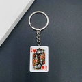 Macro detail of acrylic King of Hearts playing card pendant on a silver keychain - King of Hearts Style (JE1662G)