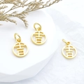 Golden round hollow Ji character pendant for DIY jewelry on white aesthetic display - Auspicious Character