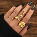 Five-piece irregular golden ring set with molten metal texture on model hand - Style (HS2032-12)