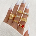 Set of 7 gold irregular lava rings with red gemstones and shell details for women - Style (HS2032-14)