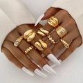 Chic 8-piece gold geometric ring set with heart crystals and lava texture on hand - Style (HS2032-15)