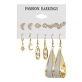 Golden earrings set with moon, star, and geometric heart designs on display card - Moon Star Infinite Symbol Style (HS630-7)
