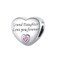 Macro shot of silver heart charm with Grand Daughter engraving and pink gemstone - Grand Daughter (PCT1013-GD)