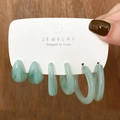 Three-pair set of light green acetate resin earrings with marbled texture on display card - Light Green Ink Marble (HS0032-9)