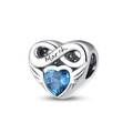 Detailed view of silver heart charm with March birthstone and infinity symbol - March Birthstone (Sky Blue)
