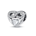 Macro detail of silver heart charm with infinity symbol and cubic zirconia stone - April Birthstone (Clear White)