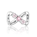 Detail of infinity charm with pink heart gemstone and Forever Love engraving - Infinity Heart Pink Stone (CCT972)
