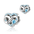 Detailed view of silver heart charm with light blue zircon and March Serenity engraving - March-Serenity (DUT19-3)
