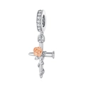 Detailed close-up of a silver cross nail pendant featuring a rose gold flower accent - Rose Wrapped Nail Cross (CCT363)