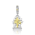 Macro shot of silver and gold plated cross pendant with inset zircon stones on white background - Two-Tone Layered Cross (CCT786)