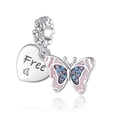 Macro detail of silver butterfly charm with pink enamel, crystals and heart pendant - Handwritten Free Heart Butterfly (CCT398)