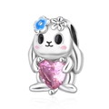 Detail view of a silver rabbit charm with blue flower and large pink heart-shaped stone - Heart Rabbit (CCT525)