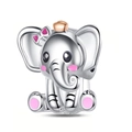 Macro view of cute silver elephant charm with pink enamel bow and small golden crown - Crown Elephant (CCT096)