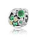 Macro detail of silver charm with green heart gems and enamel floral tree pattern - Green Enamel Floral Bead (CCT992)
