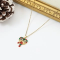 Detail of Christmas candy cane heart pendant with enamel and gold bow on gold chain - Candy Cane Heart Style (W1618)