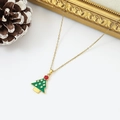 Detailed view of gold Christmas tree necklace with green enamel and sparkling rhinestones - Green Enamel Christmas Tree (W1621)