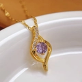 Macro shot of 18K gold plated clover pendant with purple zircon and wavy diamond inlay - Wavy Curve Style (107+Lip)