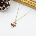 Detailed macro view of a gold snowman pendant necklace with festive enamel craftsmanship - Striped Winter Snowman (W1630)