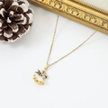 Golden Christmas bell necklace with colorful inlaid crystals and white enamel pendant - Colorful Rhinestone Christmas Bell (W1633)