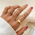 10-piece gold alloy rings set featuring wave, cross, and hollow heart designs for women - Open Ring Set / 10-Piece Set / Gold (HS734-1)