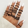 Set of 18 pieces stackable black geometric spiral rings on model with white background - Deep Black Geometric Twist Style (HS1440-1)
