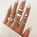 Detail of silver butterfly and pearl ring set worn in layers on hand with white nails - Silver Heart Butterfly Pearl Set (HS1488-16)