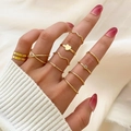 10-delige gouden ringenset met minimalistische harten, golven en getextureerde banden - Verstelbaar Open / Minimalistische Golf Hart Stijl (HS701-11) / 9-Delige Set / Goud