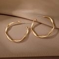 Minimalist twisted golden geometric hoop earrings with matte frosted finish and silver pins - Twisted Large Hoop Style (HS1061-4)