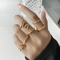 5-delige goudkleurige stapelringen set met vlinder, slang en zirkonia accenten - Verstelbaar Open / Serpentine Vlinder Hanger Combinatie (HS701-22) / 6-Delige set / Goud