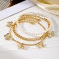 Set di tre cavigliere dorate con farfalle e perle con catena spessa e ciondolo a cuore - Set di Tre Pezzi Perla Farfalla e Catena a Spirale (HS1460-5)