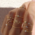 Ensemble de 10 bagues empilables dorées avec motifs de cœur et d'étoile-lune pour femme - Style Lettre Love et Cœur Évidé (HS1316-11)