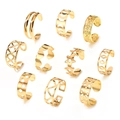 Close-up of 10-piece gold ear cuff set with moon, star, and geometric cutout designs - Moon Phase Floral Star Geometric Gold Style (HS1526-3)