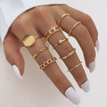 Lot de 9 bagues de phalange dorées avec strass œil et charms soleil sur mannequin - Style Géométrique de Chaîne / Or (HS1304-4)