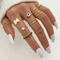 Gouden 10-delige ringenset met vlinder, boze oog en kristallen accenten op hand - Goud (HS1304-15)