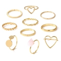 10er-Set goldene Legierungsringe mit Herz- und Schmetterlingsdesign und rosa Steinen - 10-teiliges Set / Gold Hohlherz Rosa Stein Stil (HS1418-7)