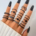 16-piece black alloy ring set featuring wave patterns, crystals, and faux pearls - Deep Black Wave Rhinestone Style (HS1440-2)