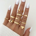 Set of 11 gold geometric rings featuring star, heart, and textured wave designs for women - Gold Heartbeat Star Set (HS1488-13)