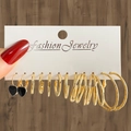Goldenes Ohrring-Set mit gedrehten Creolen und schwarzen Herz-Anhängern auf Karte - Gold Herz Reifen Kombination (HS1469-22)