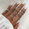 Bohemian retro silver ring set featuring sun, star, and flower motifs on a hand - Star Moon Wave (HS1475-7)