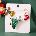 Christmas brooch set with enamel reindeer, tree, and sock designs on display card - Christmas Sock Tree Reindeer Brooches (HS1537-7)