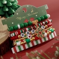 Set de 5 pulseras navideñas con dijes de copos de nieve y cuentas con HAPPY - Estilo Rojo Verde Blanco Con Letras HAPPY Copo (HS1576-3)