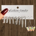 Set van 6 paar zilverkleurige oorbellen met parels en vlinderhangers op een sieradenkaart - Vlinder Hanger Parel Oorbellen Set (HS1484-18) / 6 paar set / Zilver