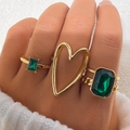 Gold ring set featuring emerald green stones and a large hollow heart design - Emerald-Look Rhinestone Heart 3-Piece Set (HS1981-7)