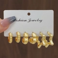 Set of three pairs of chunky gold-toned CCB hoop earrings on a display card - 3 Pairs Gold Textured Smooth Star Style (HS1580-6)